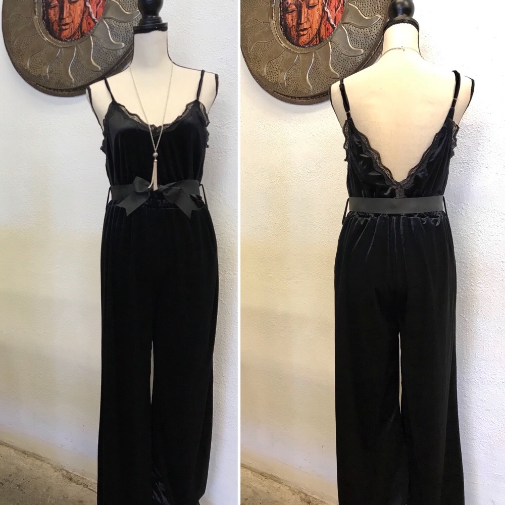 Black Licorice Velvet Jumpsuit with waist bow.